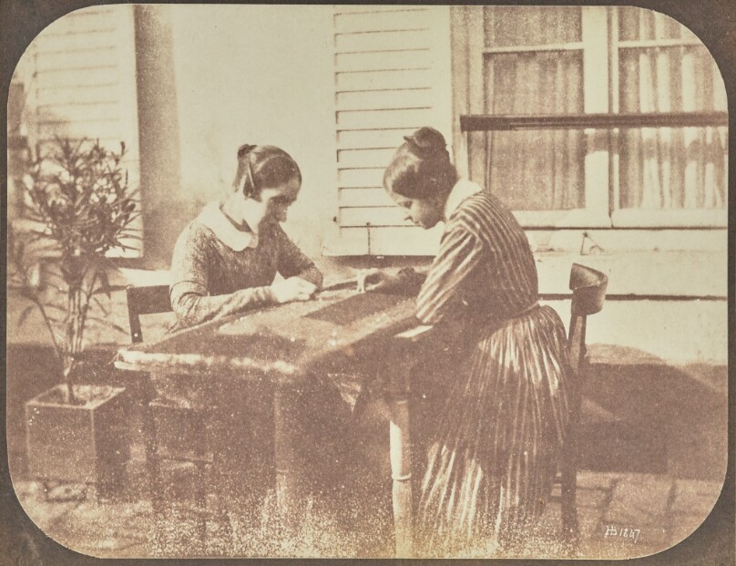 [Two Women Embroidering Outdoors]