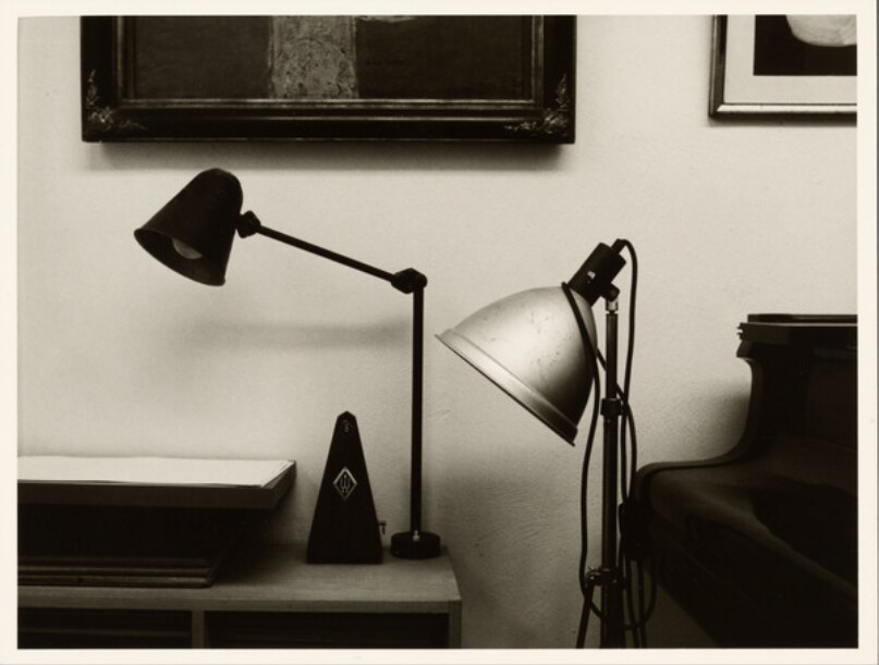 [Two desk lamps and metronome]
