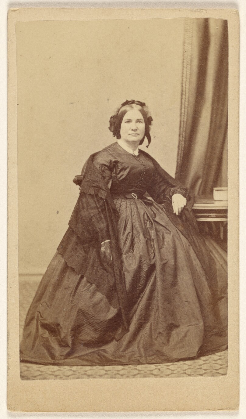 [Unidentified woman, seated]