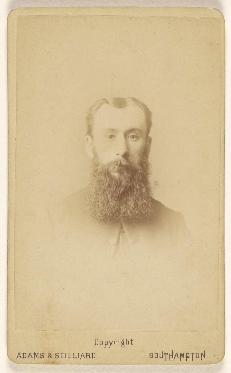 [Unidentified man with a long, square-cut beard, printed in vignette-style]