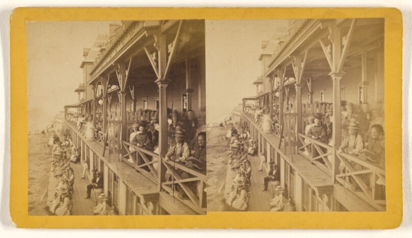 [View of a long porch filled with people, possibly at Hartford, Connecticut]