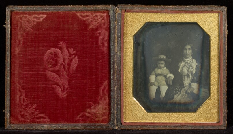 [Portrait of a Woman with a Young Boy Wearing a Hat]