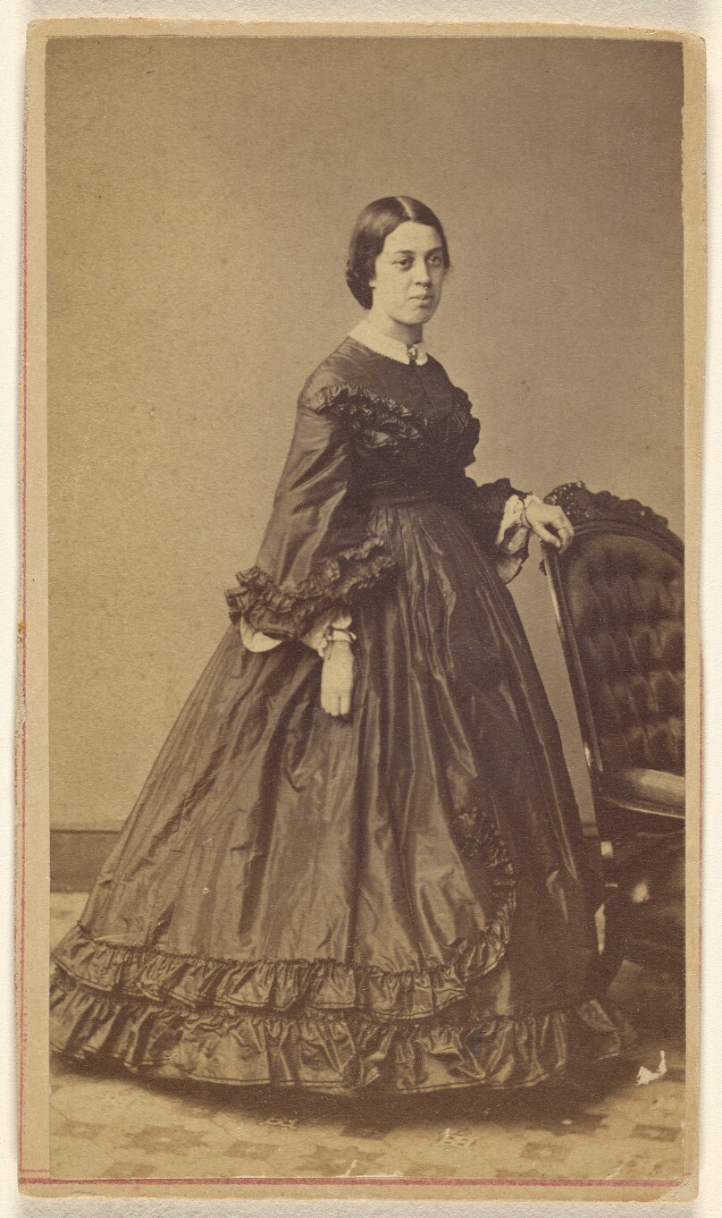 [Unidentified woman, standing]
