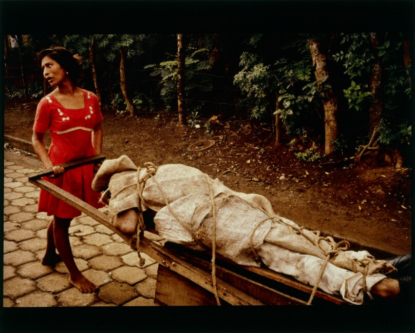 Nubia carrying her husband home to be buried in their backyard, Nicaragua (2010.5.5)