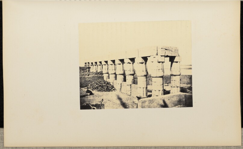 [Stone columns with papyrus capitals]