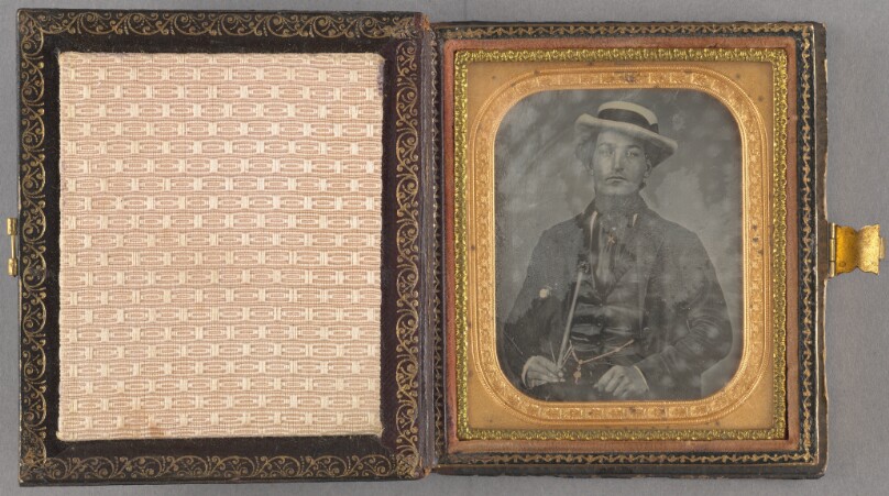[Portrait of a Seated Man in Hat]