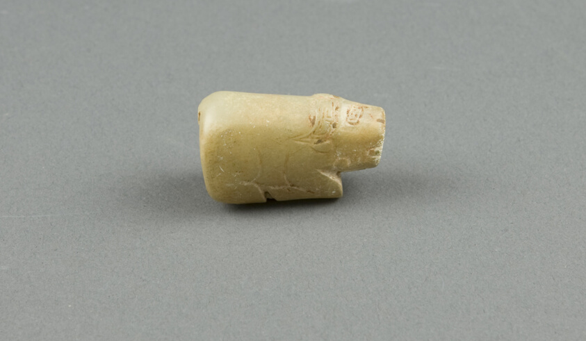 Bead, crouching buffalo.