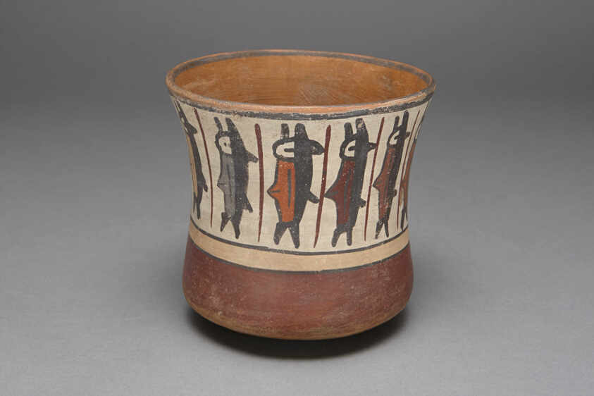 Cup Depicting a Band of Abstract Fish