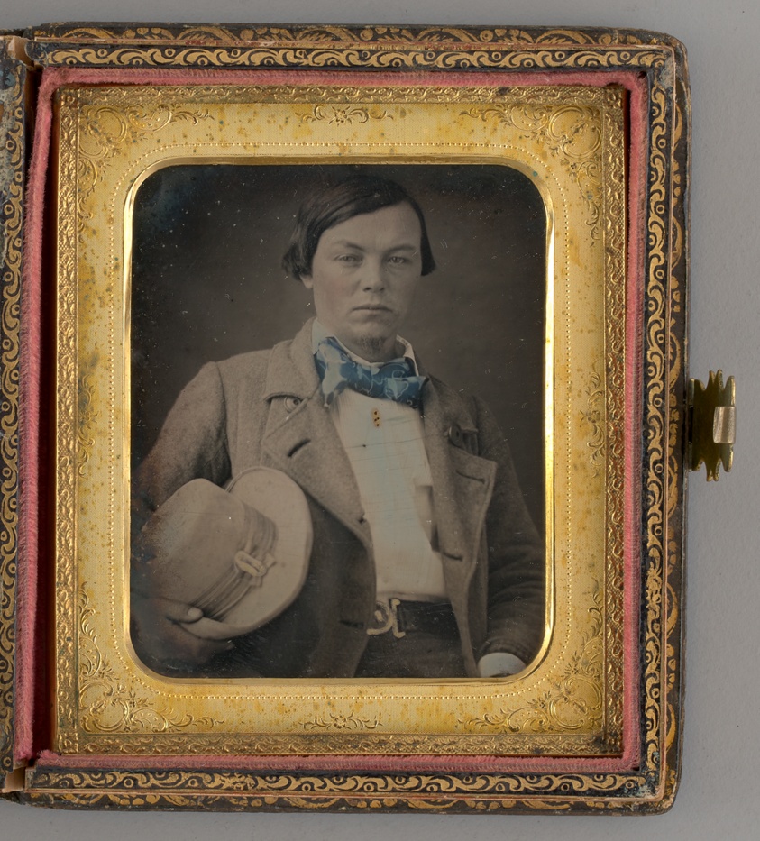 Untitled (Portrait of a Boy Holding a Hat)