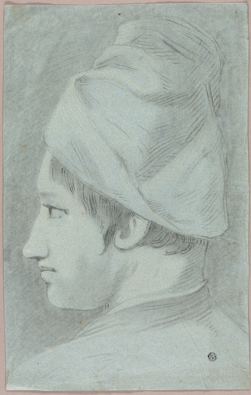 Head of Boy Wearing Hat in Profile
