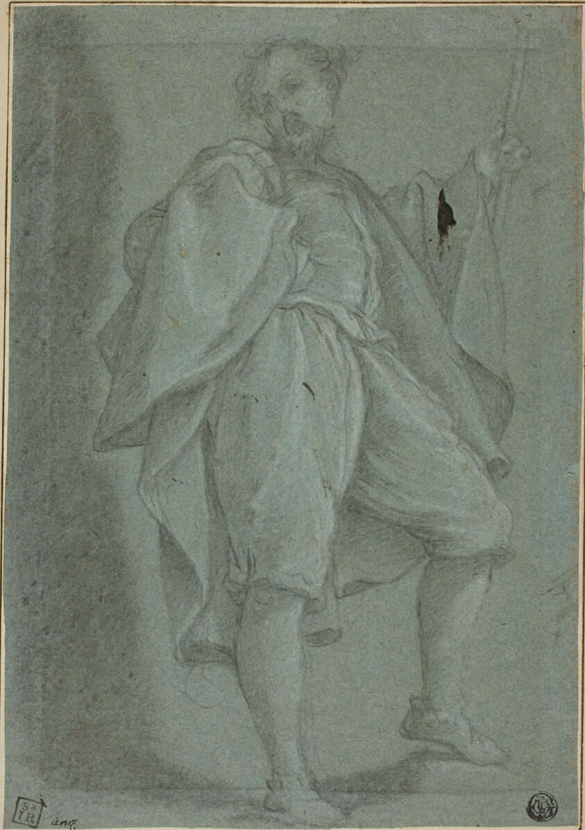 Man Standing with Staff