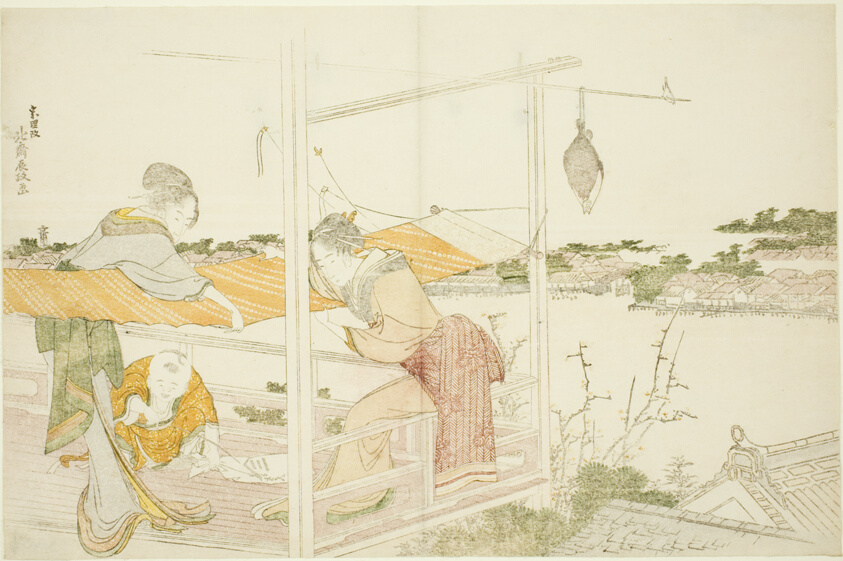 Women on a Veranda Stretching Cloth to Dry