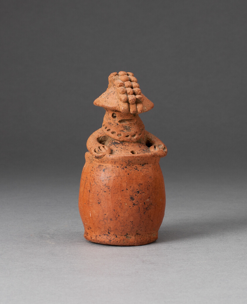 Miniature Rattle in the Form of a Figure Wearing Headdress and Mask