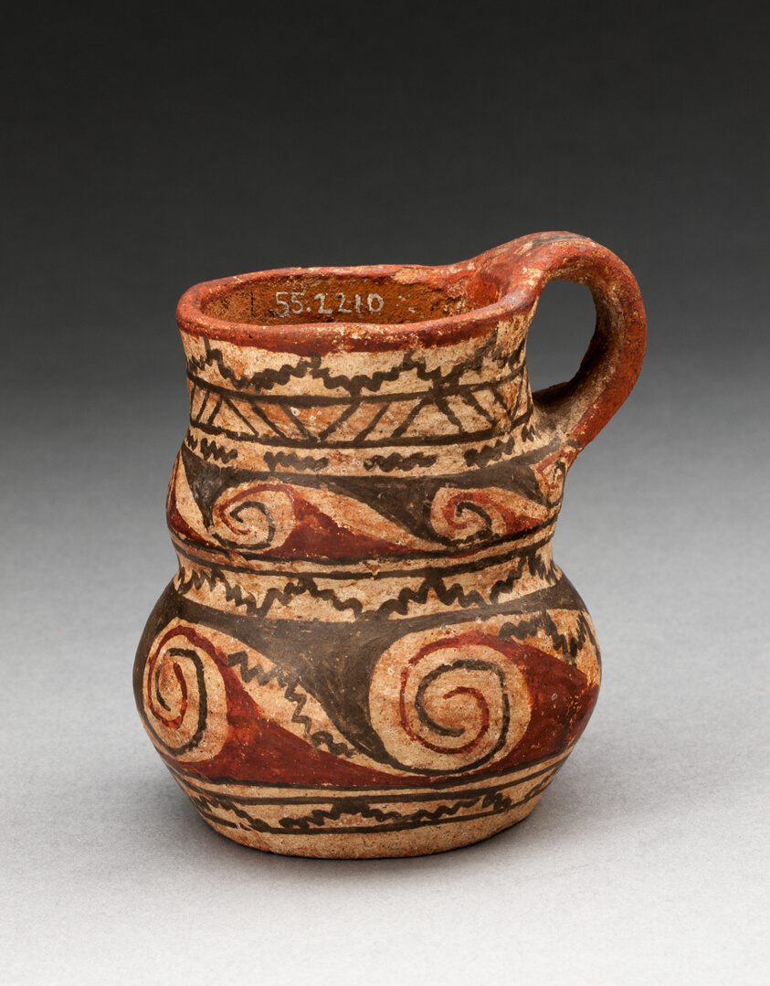 Miniature Handled Jug with Spiral and Zigzag Motifs
