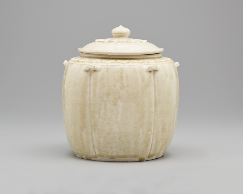 Ivory glazed 'lotus' jar and cover