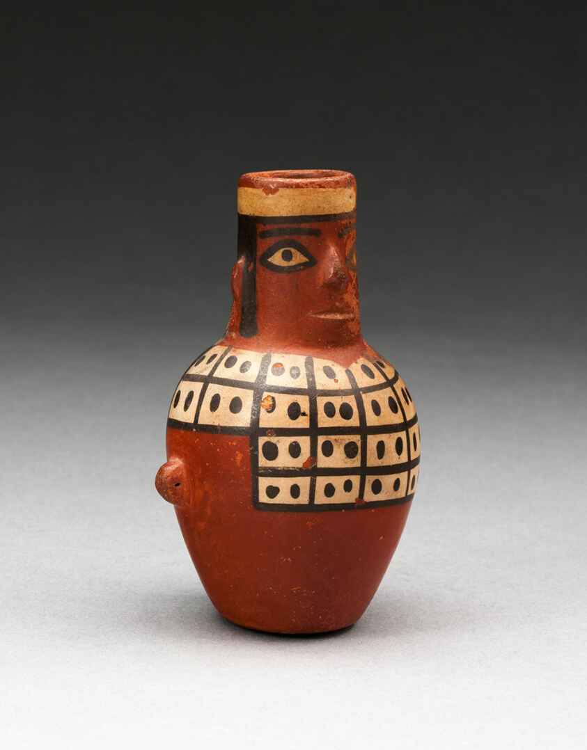 Miniature Jar in the Form of a Figure Wearing a Tunic