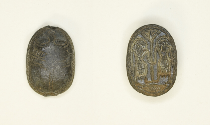 Scaraboid: Face Motif on Top; Two Figures Holding Flower on Base