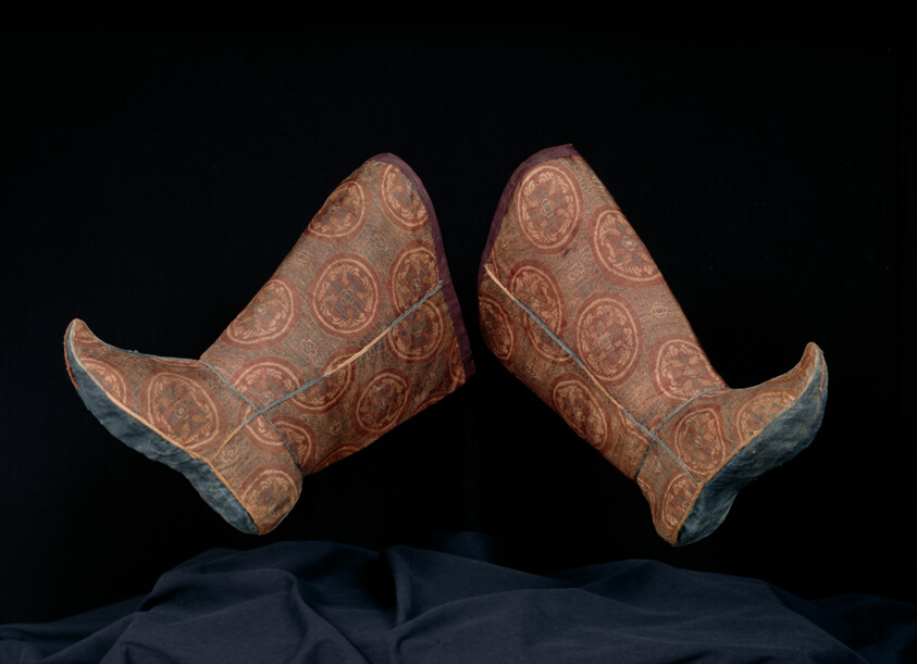 Pair of Woman's Boots with Tying Ribbon