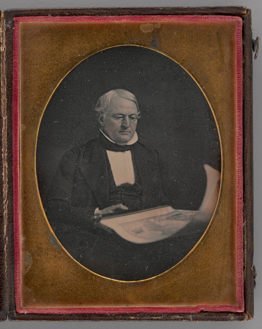 Untitled (Portrait of a Seated Man Holding a Map)