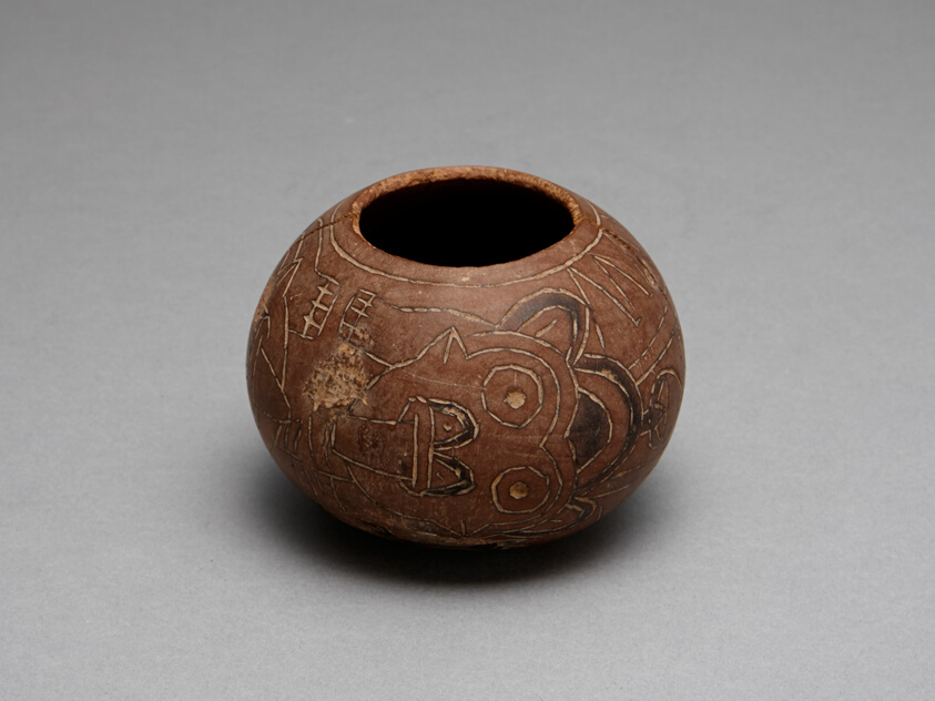 Bowl Carved with Costumed Ritual Figure With Feline and Serpent Attributes