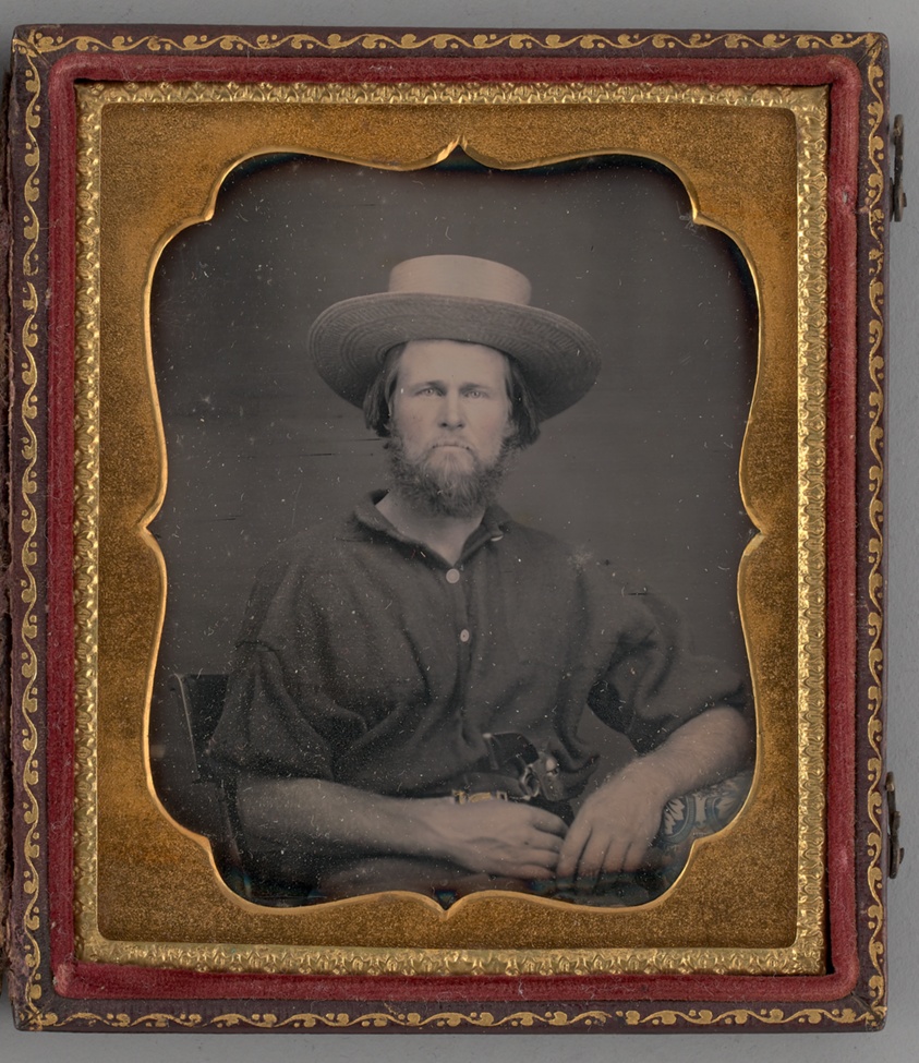 Untitled (Portrait of a Man Wearing a Straw Hat)