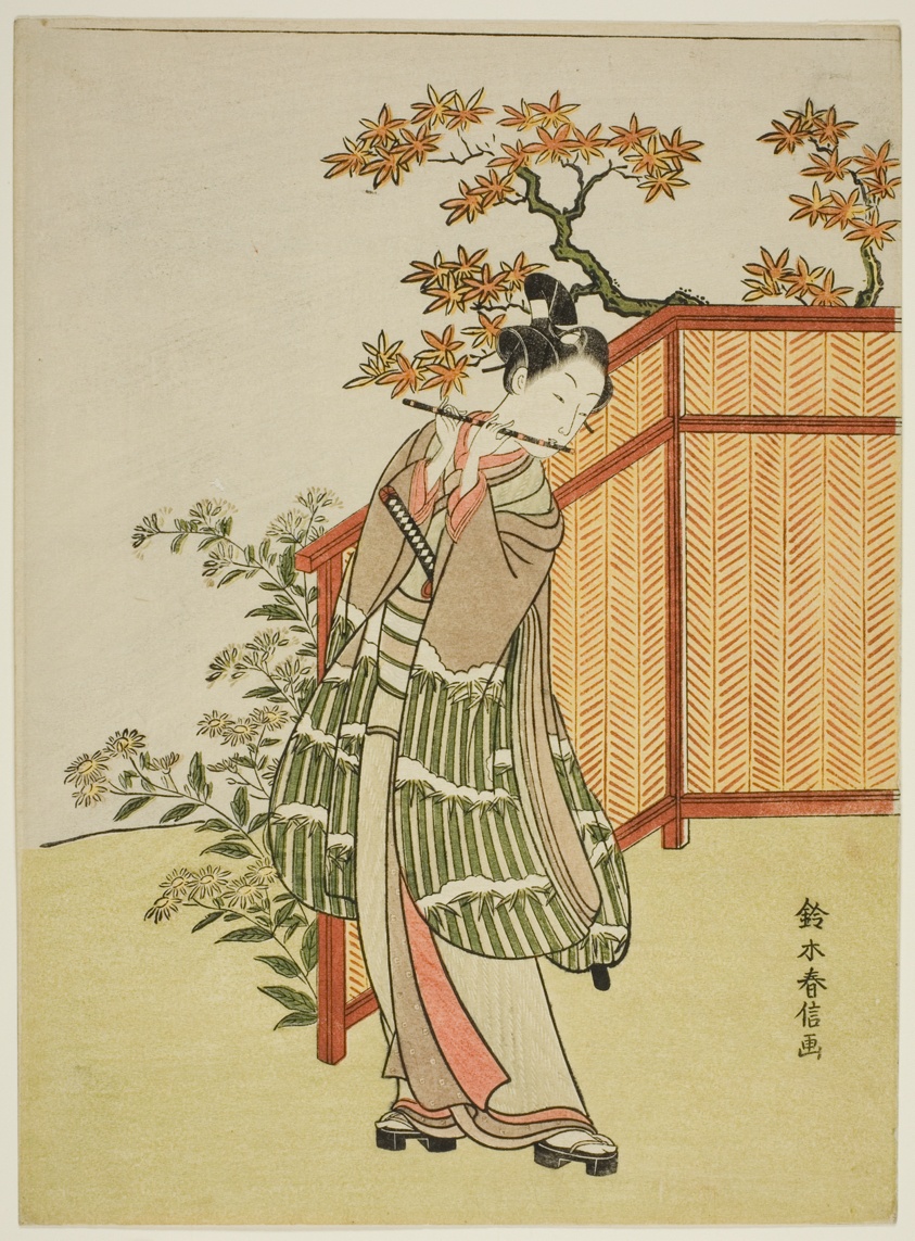 Young Man Playing the Flute Beside a Fence