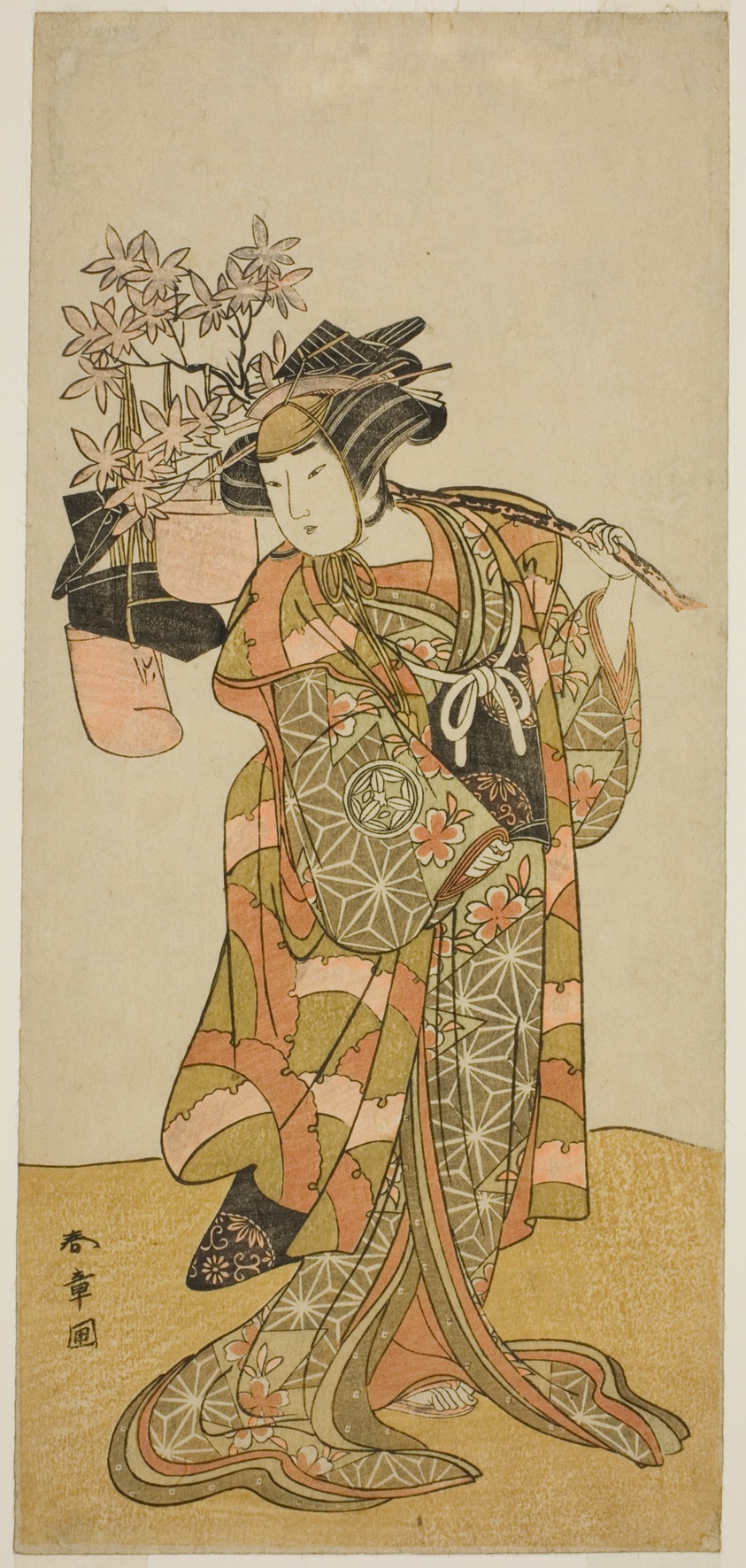 The Actor Yamashita Kinsaku II as Odai, an Eboshi (Hat) Seller, in the Play Hana-zumo Genji Hiiki, Performed at the Nakamura Theater in the Eleventh Month, 1775