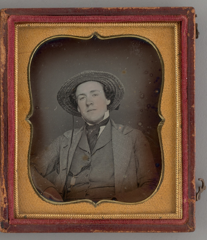 Untitled (Portrait of a Man with a Straw Hat)