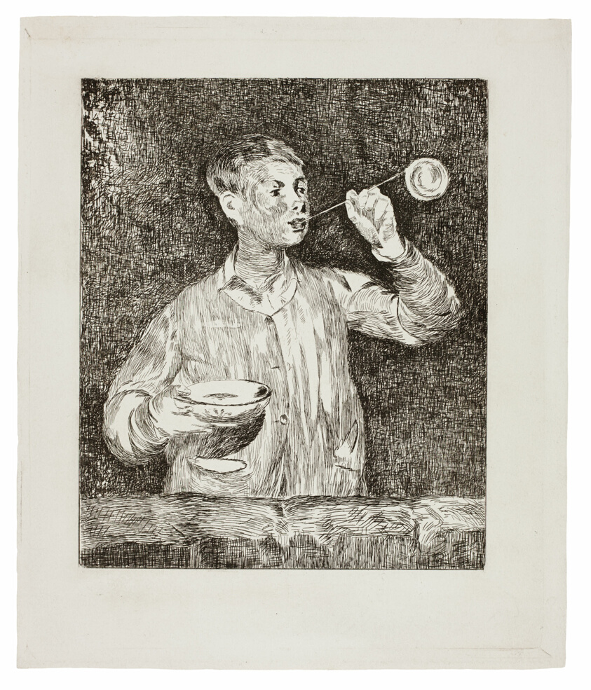 Boy Blowing Soap Bubbles