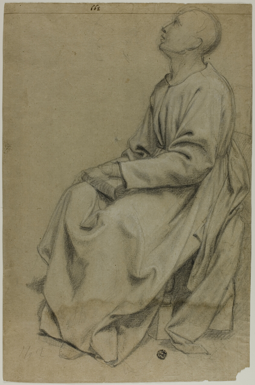 Seated Monk Holding Book