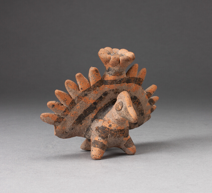 Miniature Figure in the Form of a Bird with Exaggerated Tailfeathers