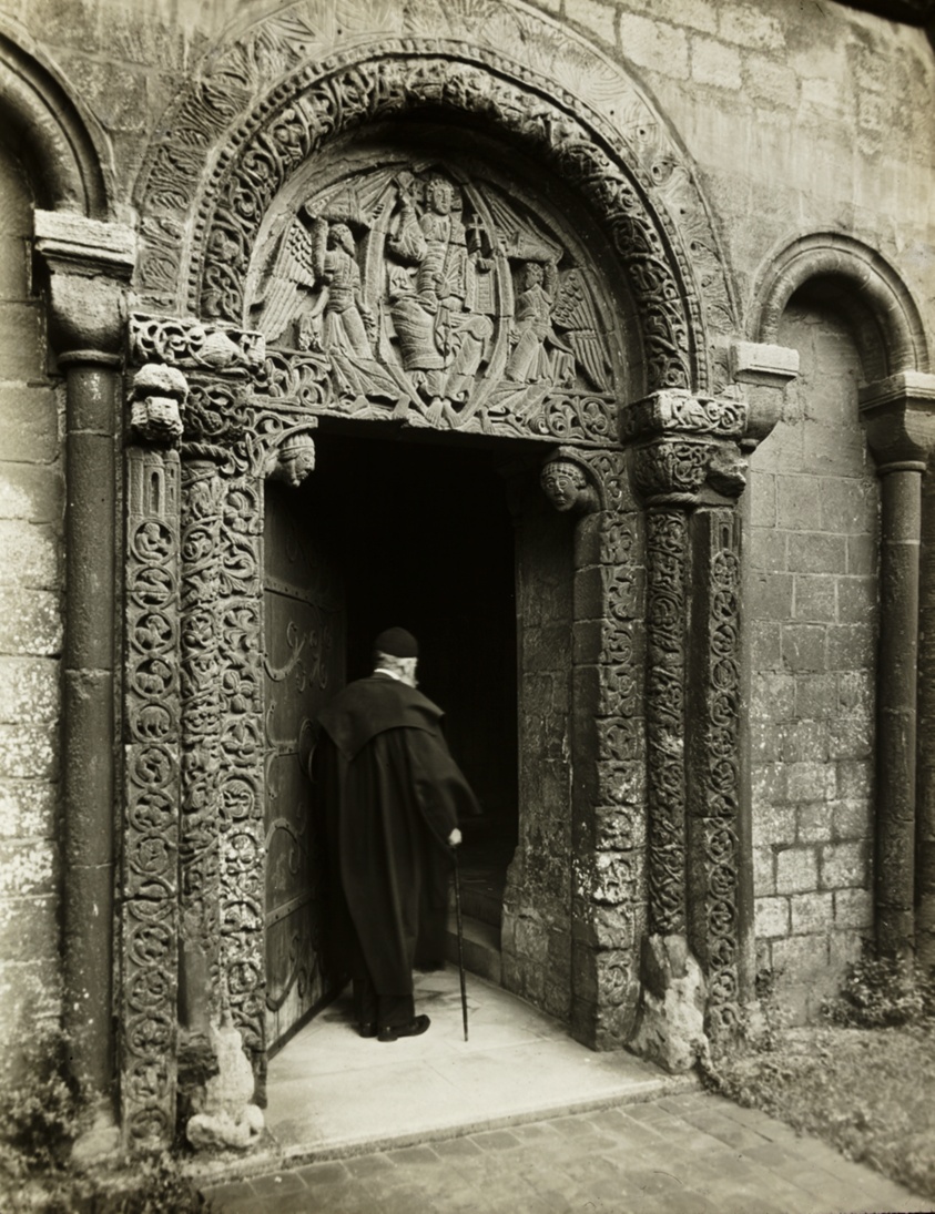 Ely Cathedral: Prior's Door, with Bedesman