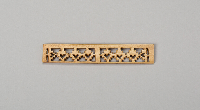 Balance-Beam Scale with Cut-Out Lattice-Like Design