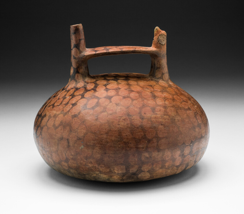 Negative-Painted Spotted Vessel with Bird-Head Spout