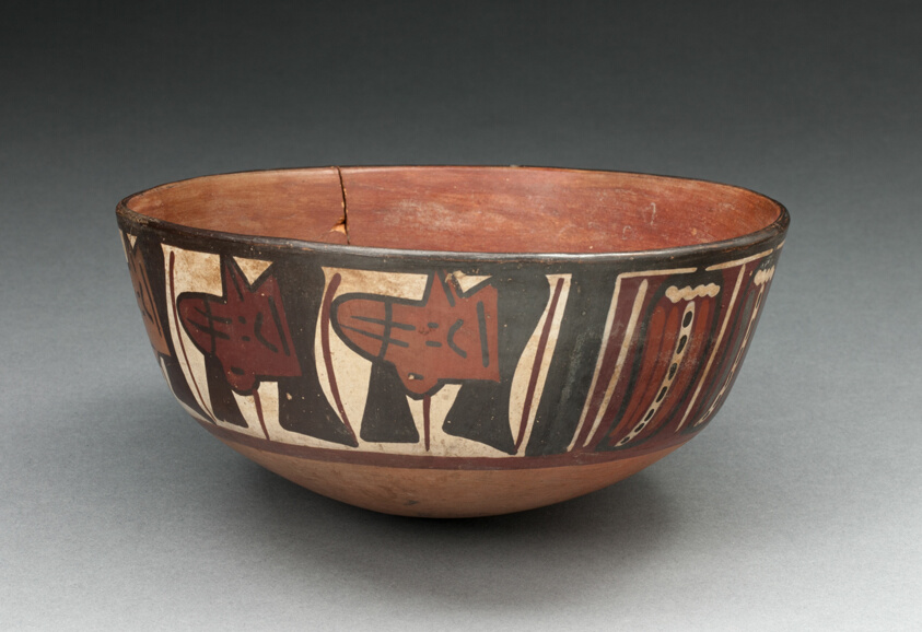 Miniature Flared Bowl Depicting Trophy Heads and Abstract Peppers