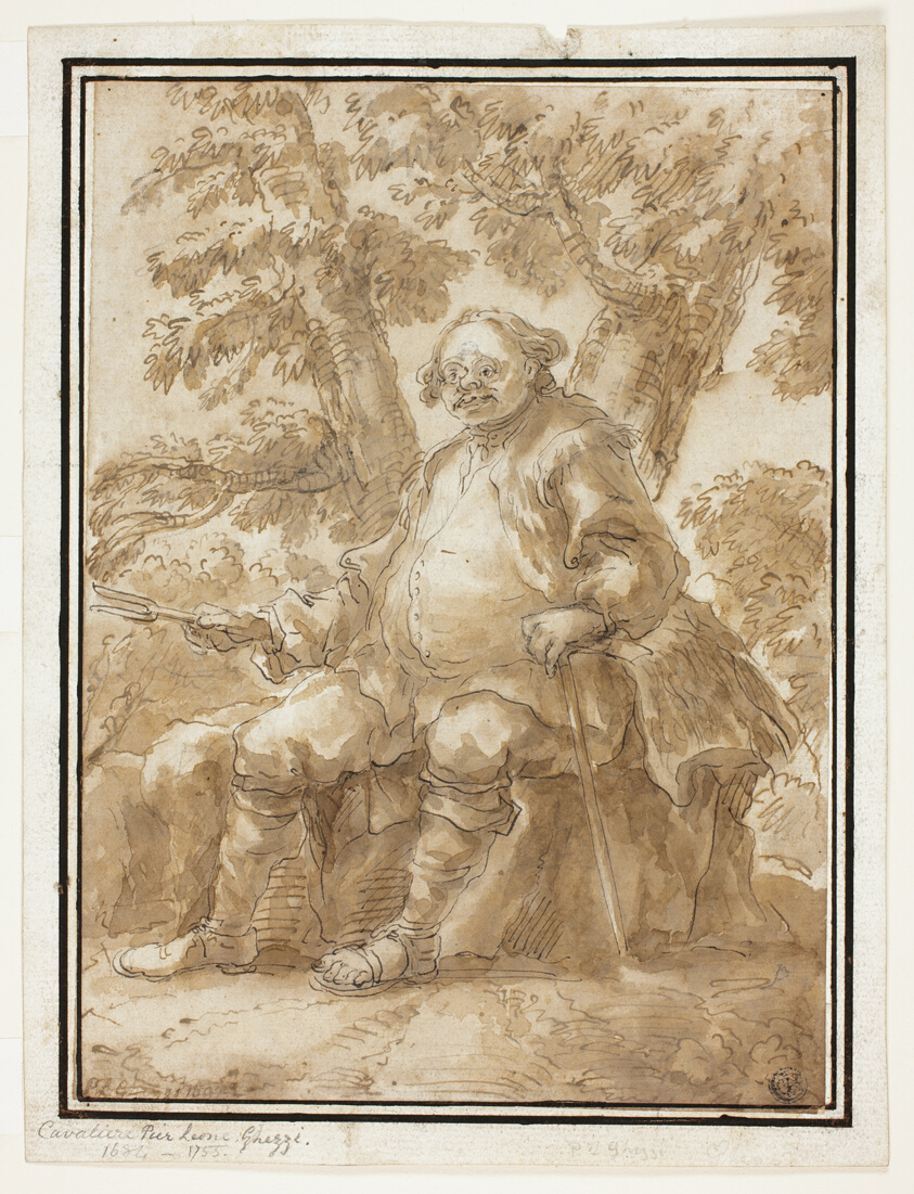 Man Seated in Front of Trees