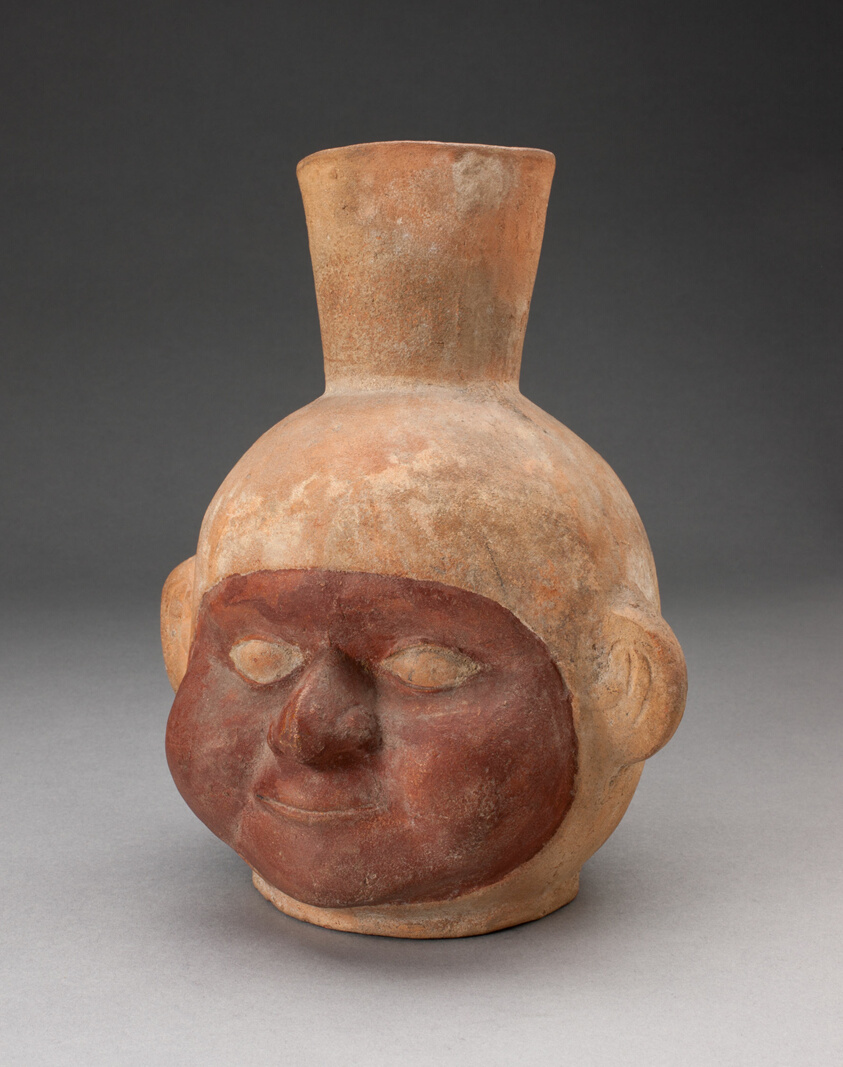 Jar in Form of a Human Head with Large Cheeks