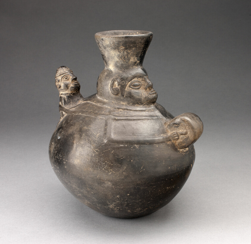 Jar in the Form of a Figure Holding a Drum and Carrying a Child